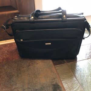 Previously Used Black, Six Department Briefcase